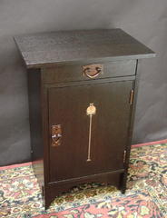 Single inlaid cabinet in Ebony stain.